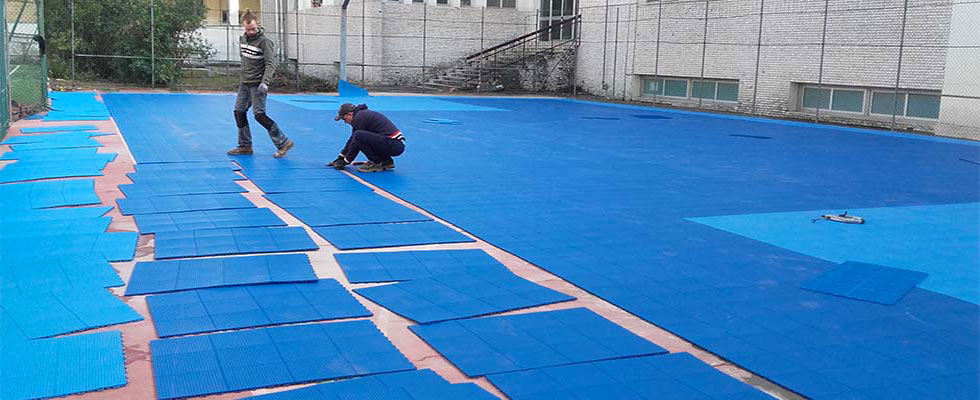 Restoration of a multisport court in a school in Rome